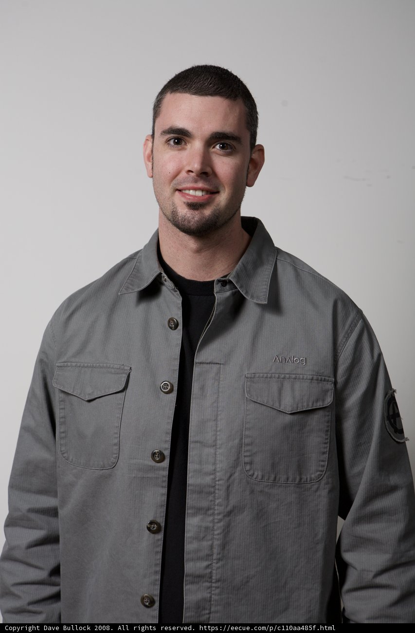 Man in Gray Shirt and Black Jacket