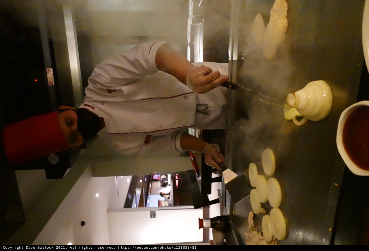 Japanese Teppanyaki Chef Cooking Behind Mask