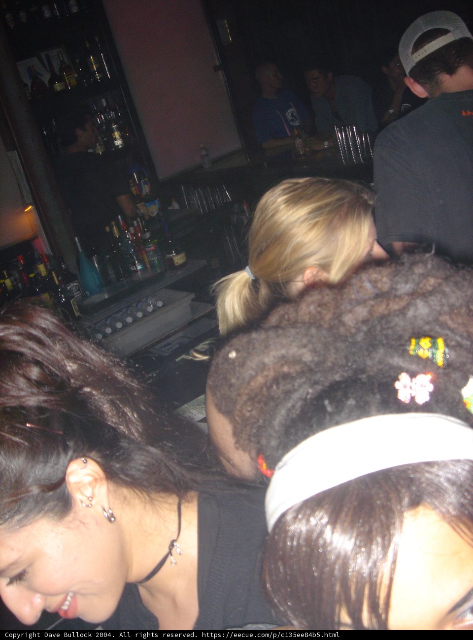 Woman in Black Shirt at Urban Bar