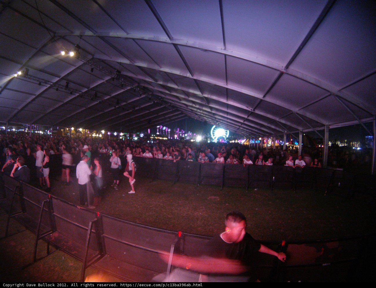 Crowd Goes Wild: Man in Sheltered Tent