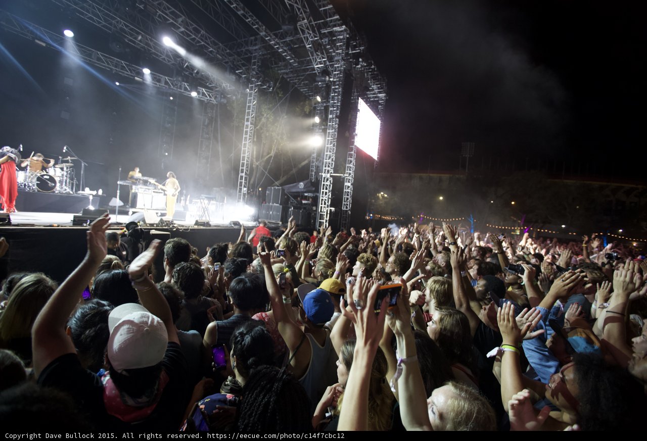 FYF Fest Wide Crowd Stage Solange Red Dress Guitarist Arms Raised Video Screen Night