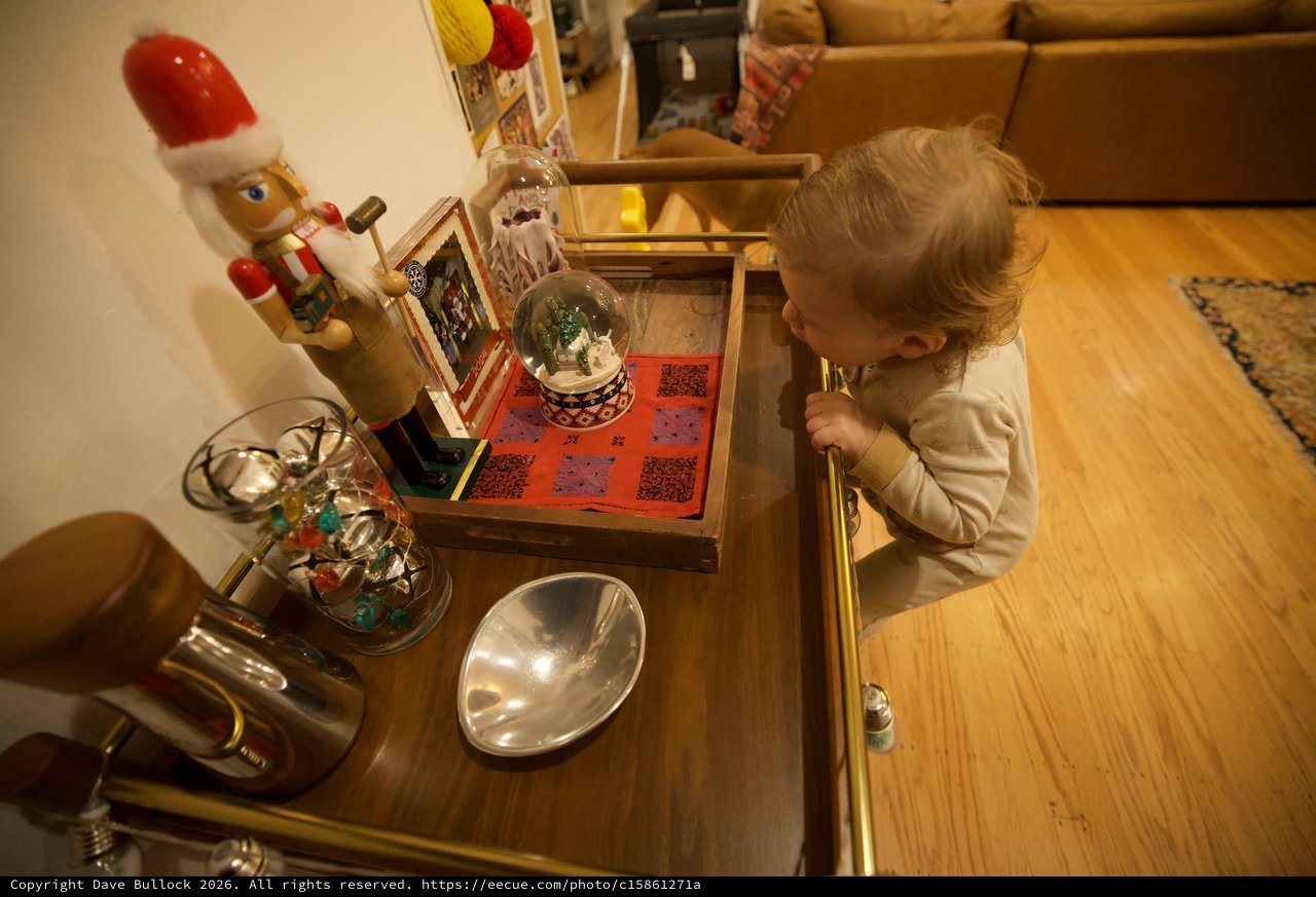 Toddler Discovering Christmas Decorations at Home