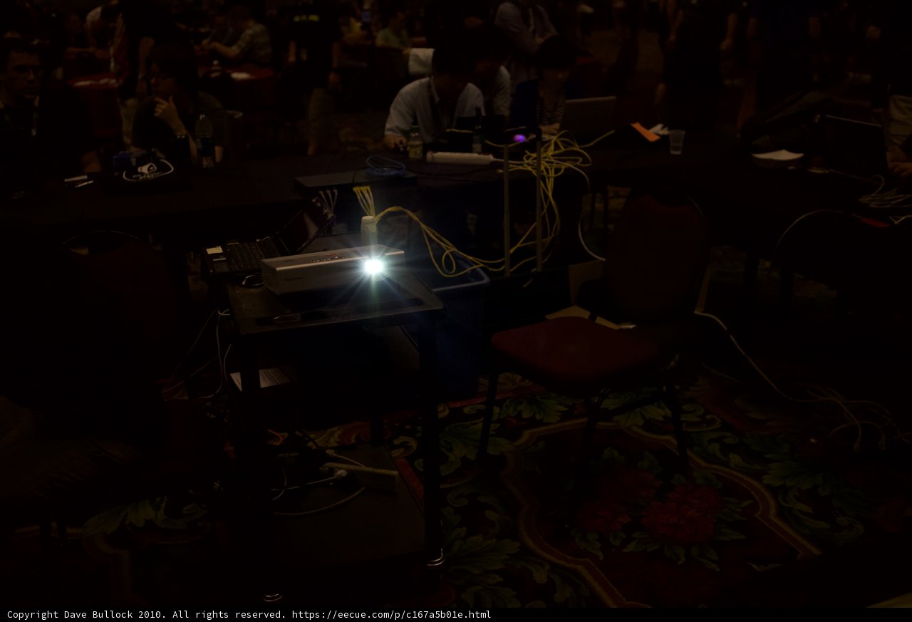 Spotlight on a seated man