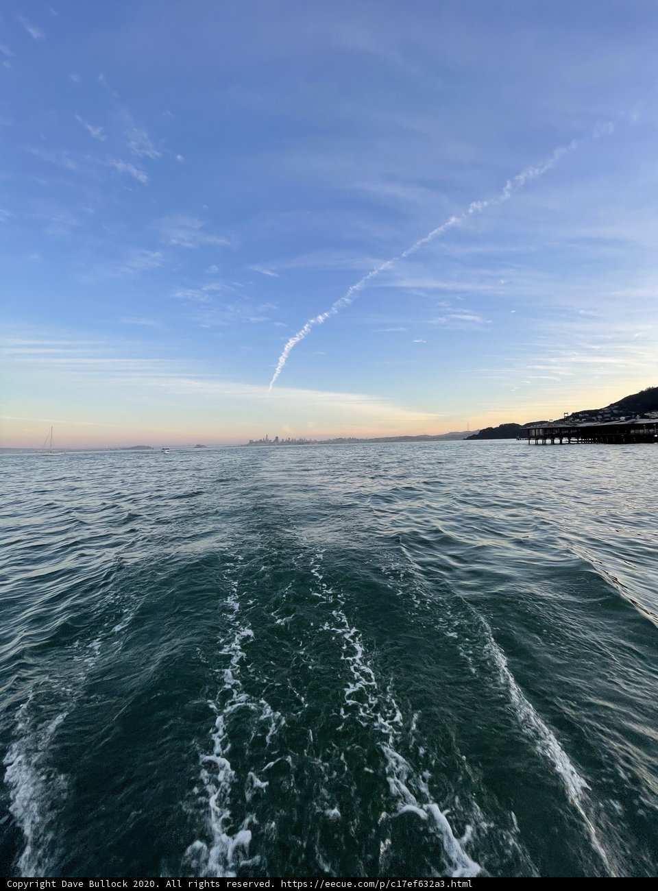 Jet Trail Across a Serene Horizon