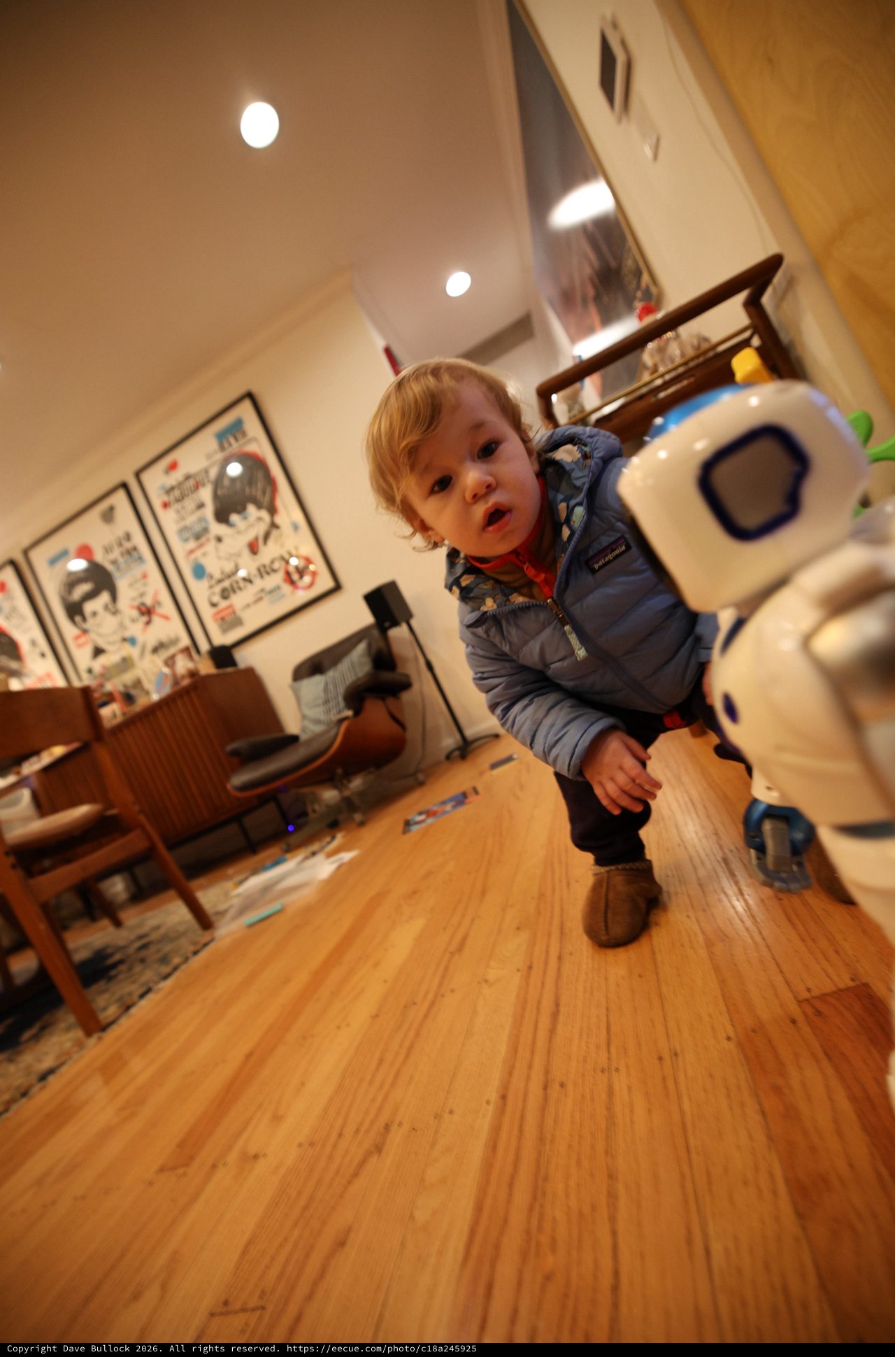 Toddler and Robot Toy in Modern Living Room