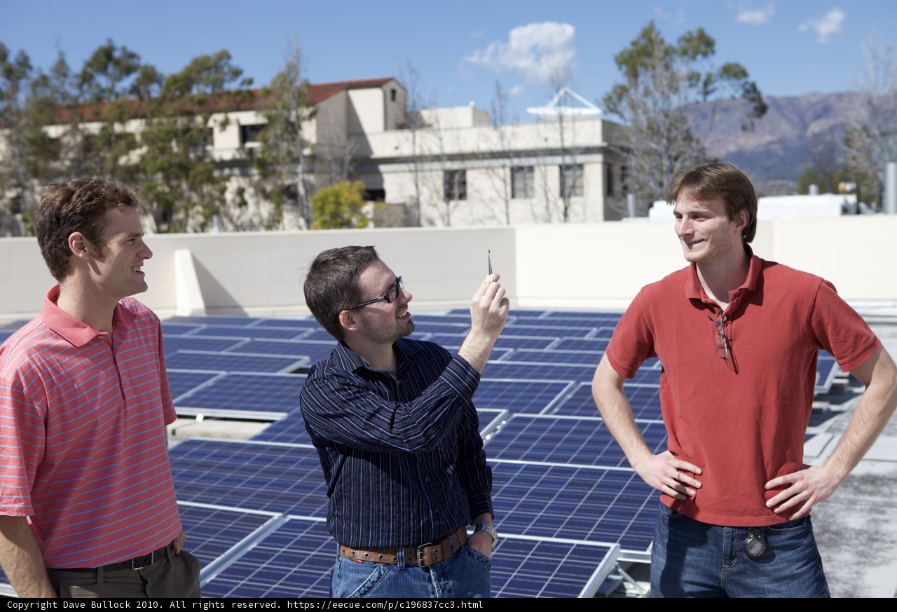 Men at Work on a Solar Rooftop