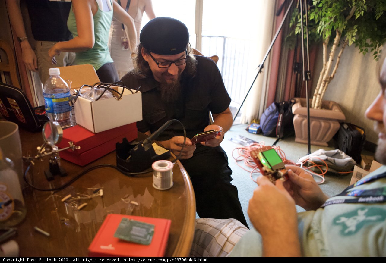 Man Working on Laptop at Table