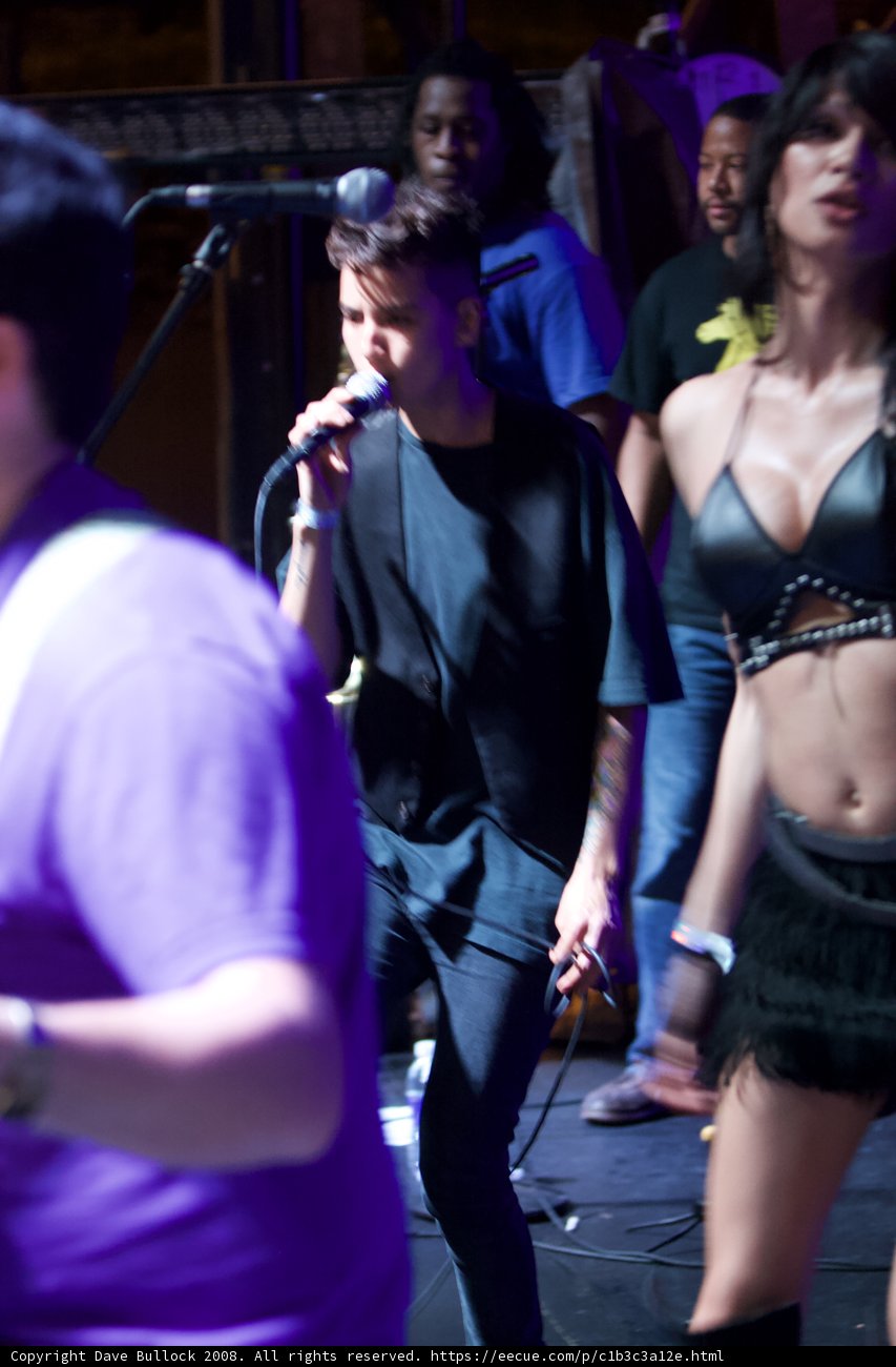 Black-Shirted Singer Rocks the Stage