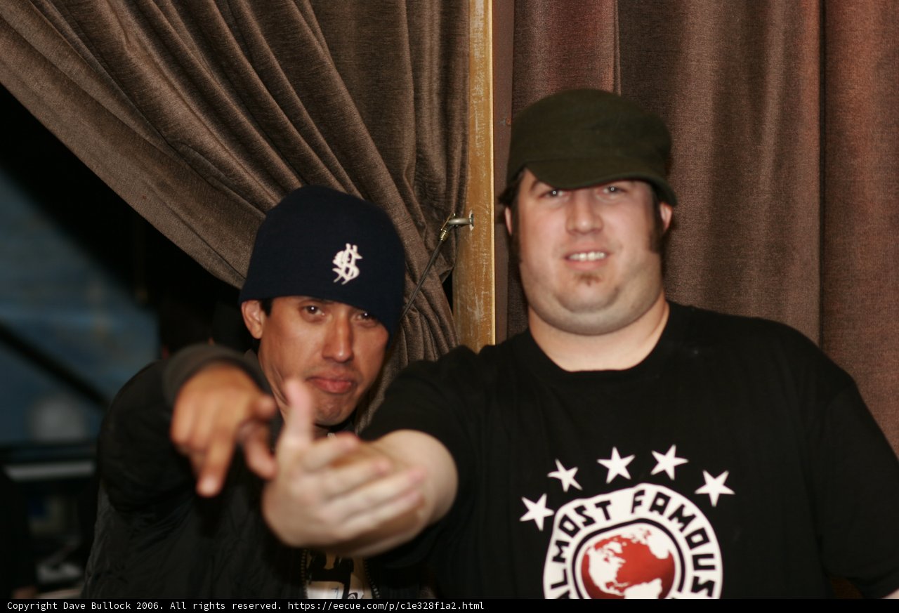 Two Men Strike a Pose