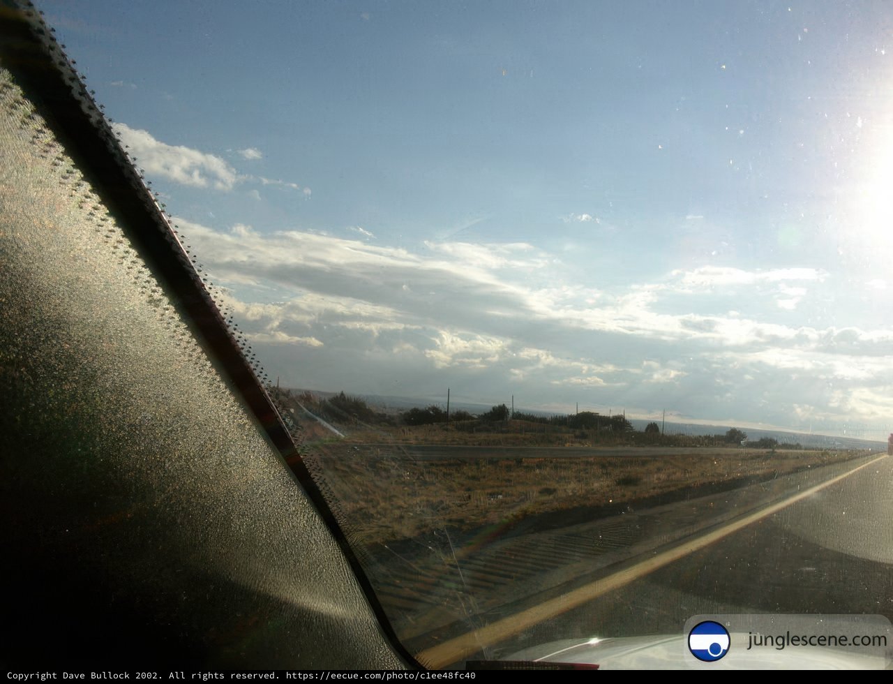 Highway drive through the snowy mountains
