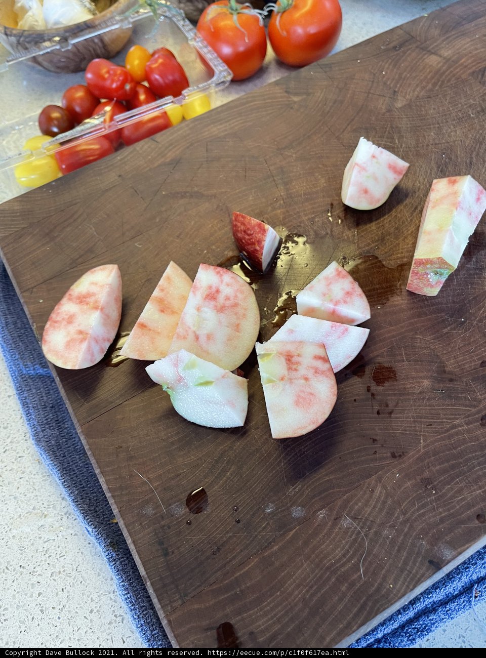 Freshly Sliced Summer Produce on a Cutting Board