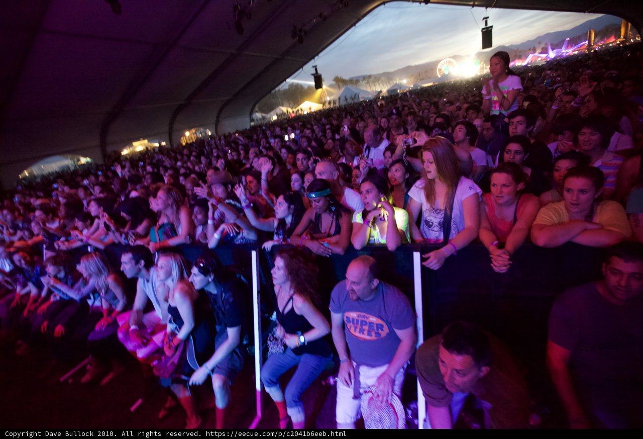 Concert Crowd and a Lone Seat