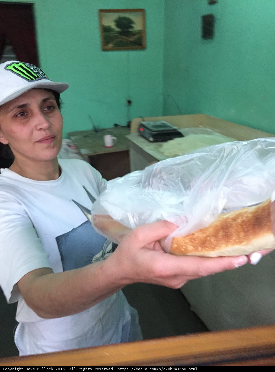 Baker Presenting Bread