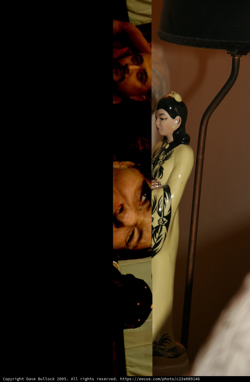 Woman Contemplates Statue Femininity
