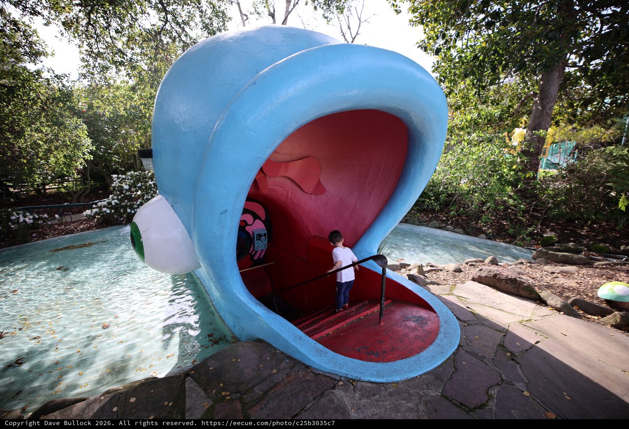 Child Exploring Giant Whale Mouth Playground Structure