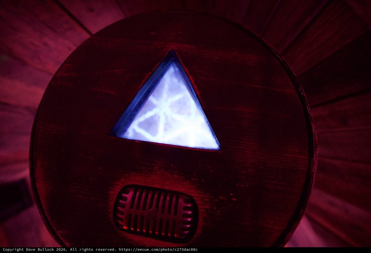 Illuminated Triforce Symbol in Crimson Chamber