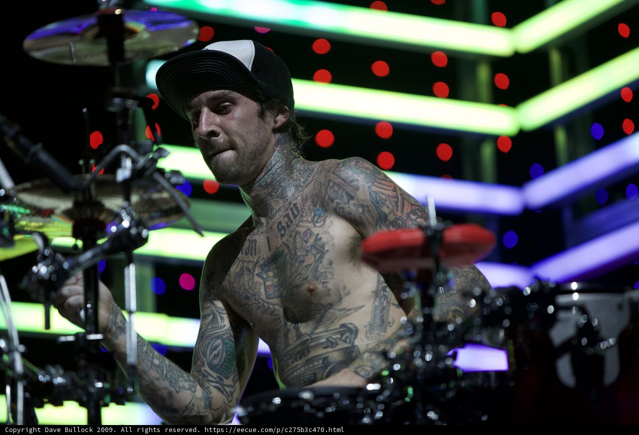 Travis Barker Rocks the Drums with His Tattoos on Display