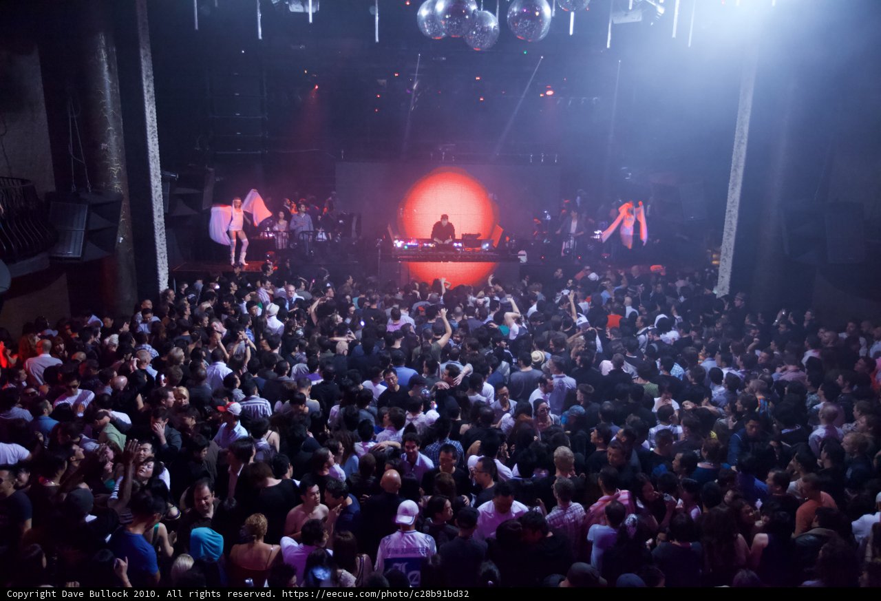 Nightlife Crowd Enthralled by Concert Performance