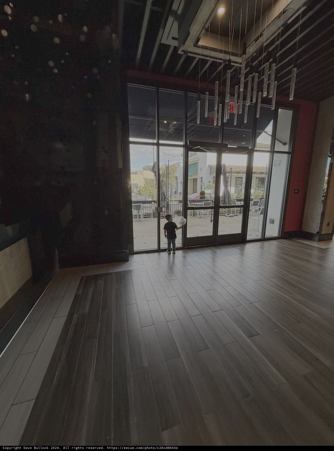 Child Silhouette in Modern Commercial Space