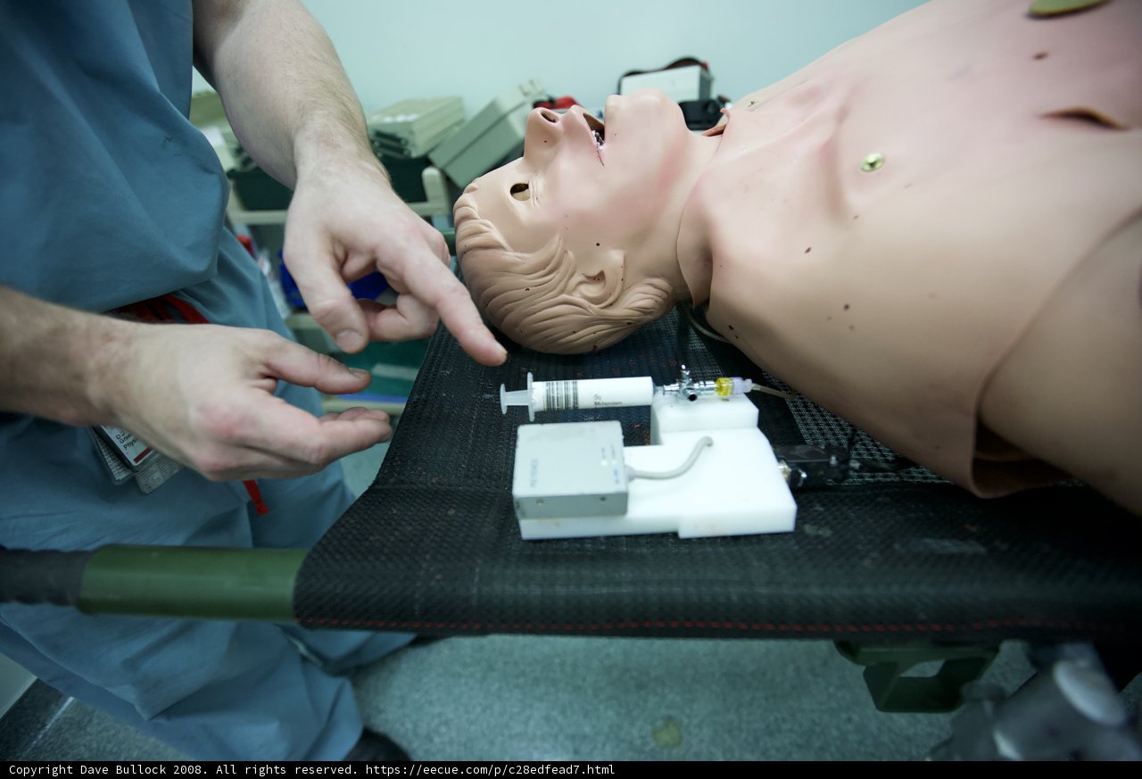 Man operating medical dummy in USC medical center