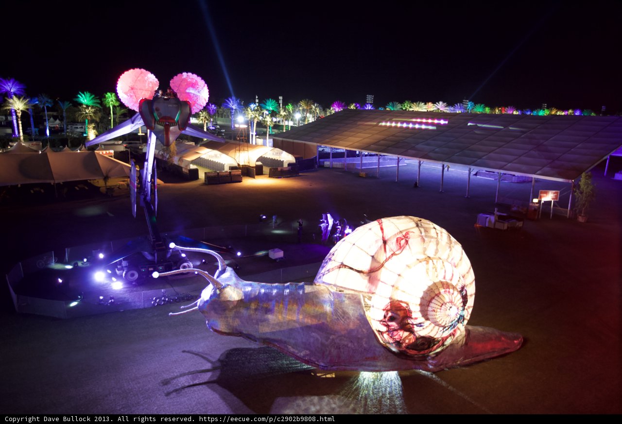 Illuminated Snail Sculpture in the Night Sky