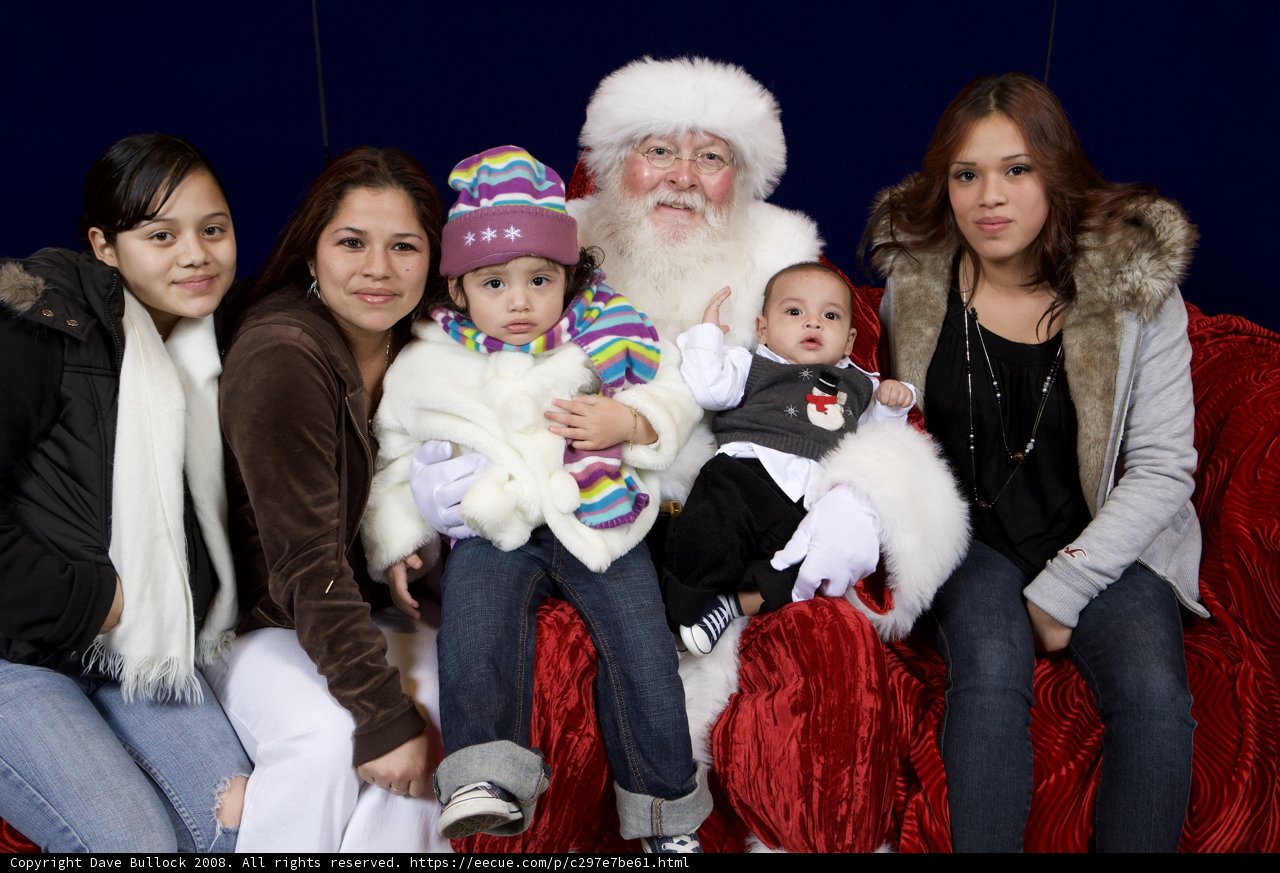 A Festive Family Portrait with Santa Claus