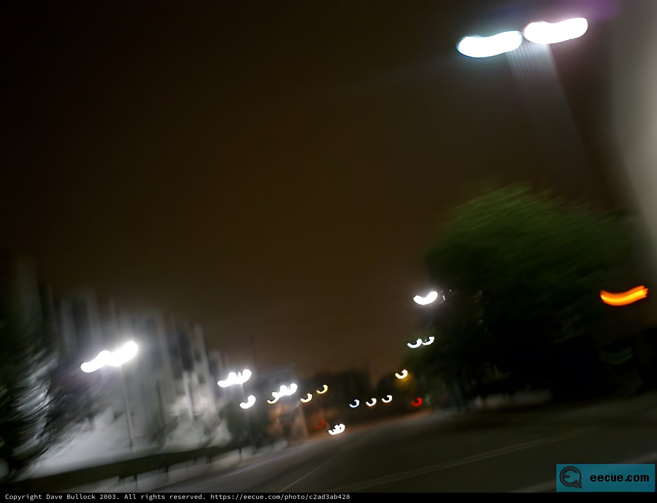 Blurred Night Lights Through Tunnel Windshield