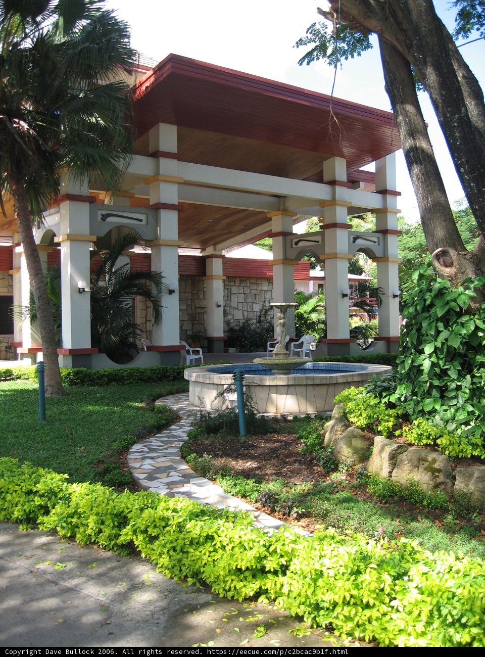 Serene Villa Porch with Majestic Tree