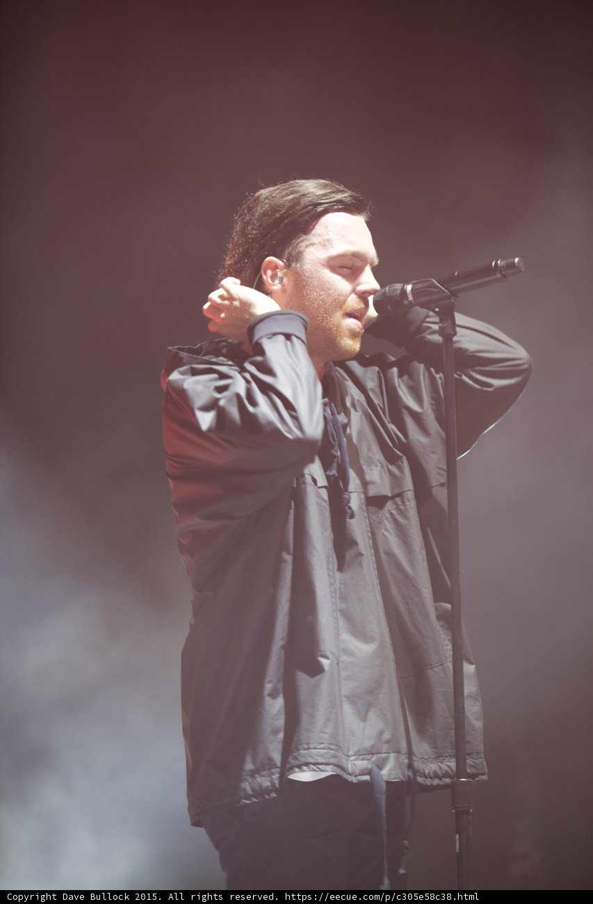 Singer Hand Behind Neck