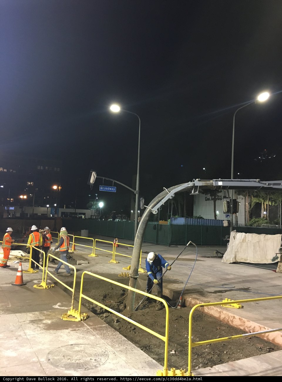 Construction Workers Building the Streets of LA at Night