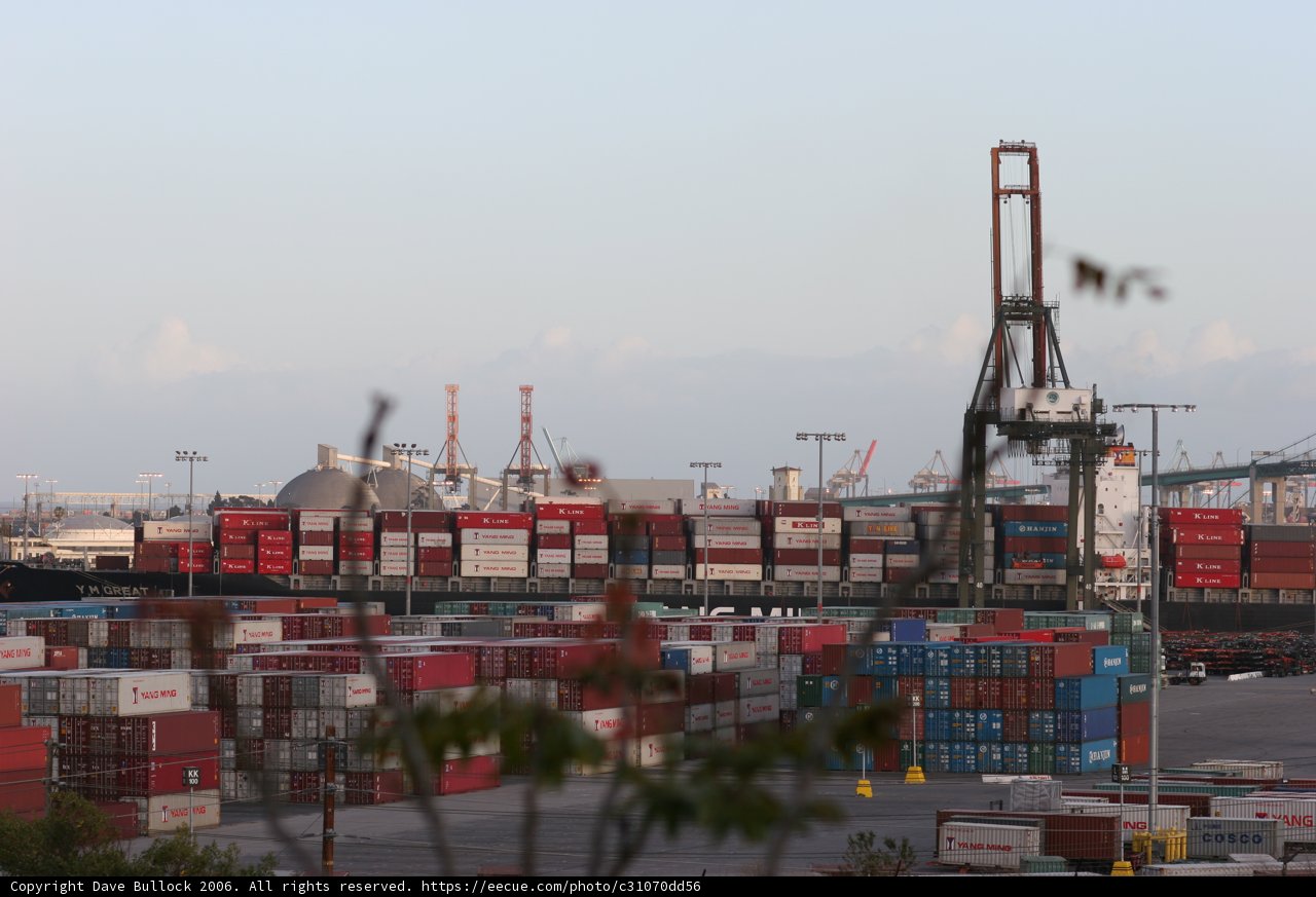 Massive Container Ship Docked at Waterfront Port