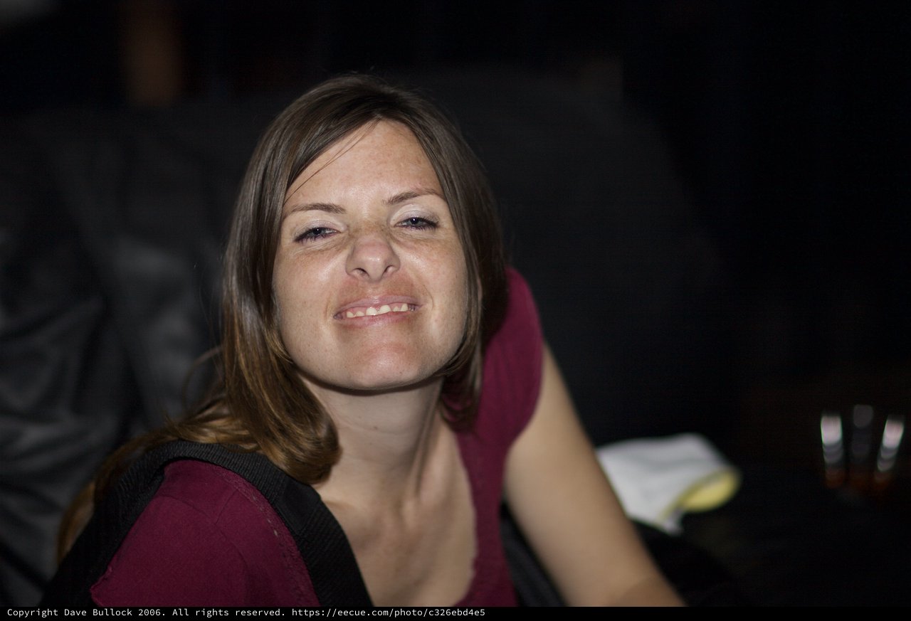 Candid Smile at a Night Venue Event