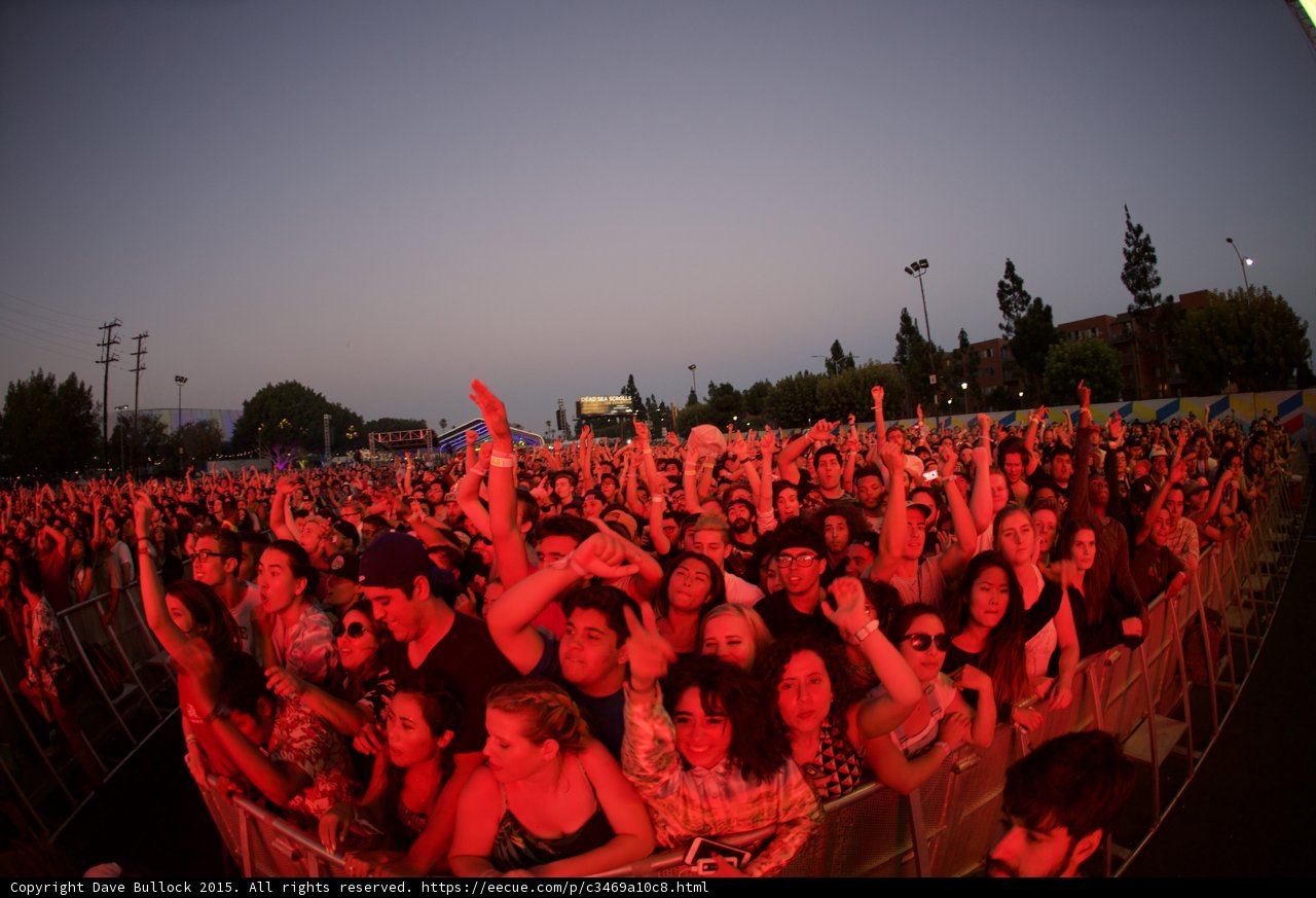 Smiling Crowd at Barrier