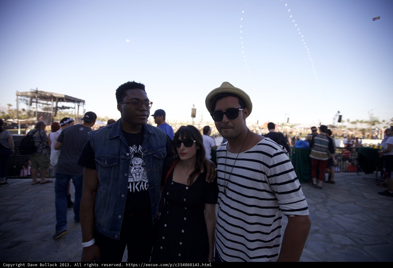 Three Friends Enjoying the Outdoor Festivities