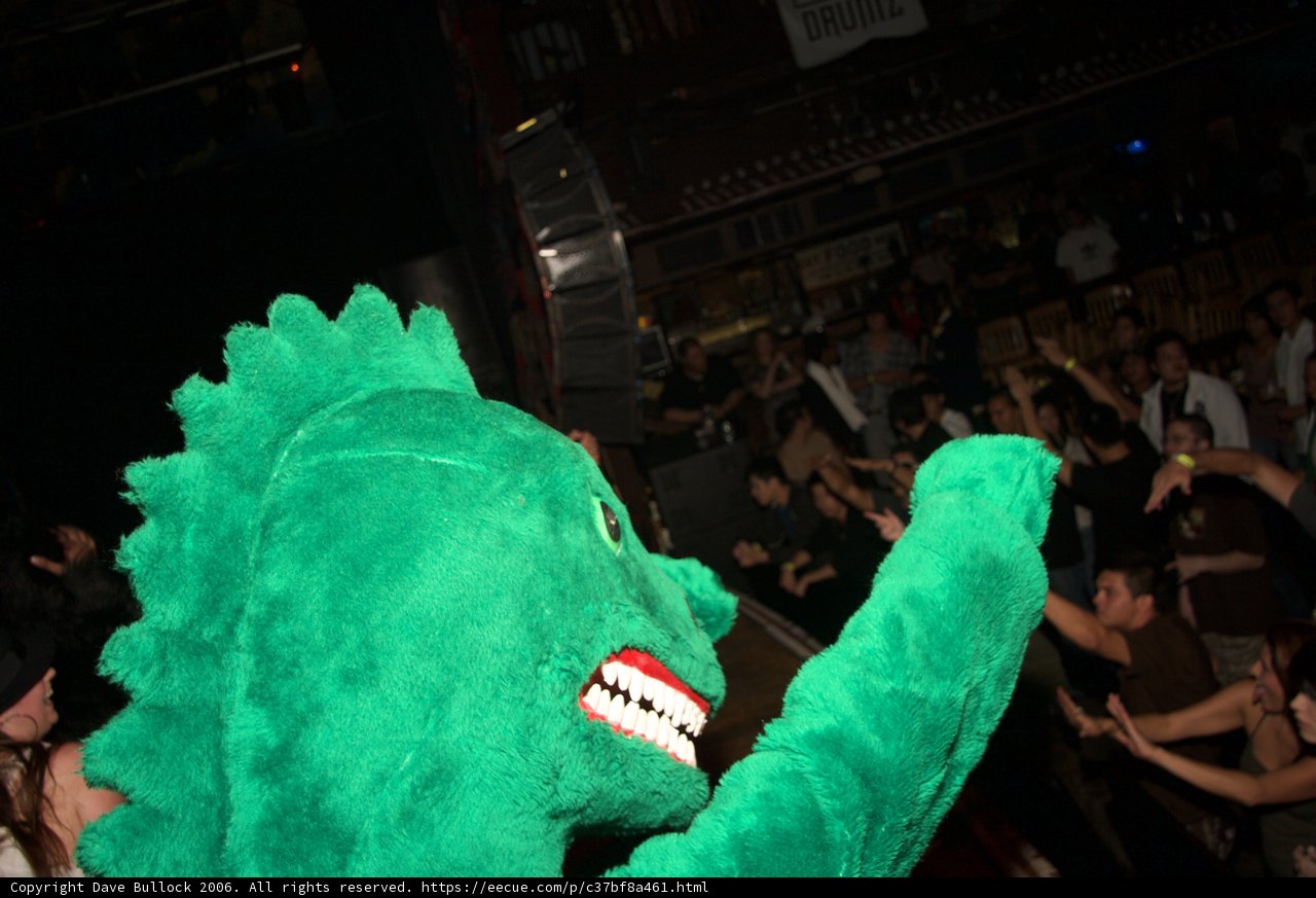 Green Dinosaur Rocks the Crowd