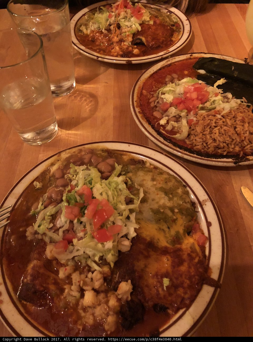Three plates of delicious Mexican cuisine