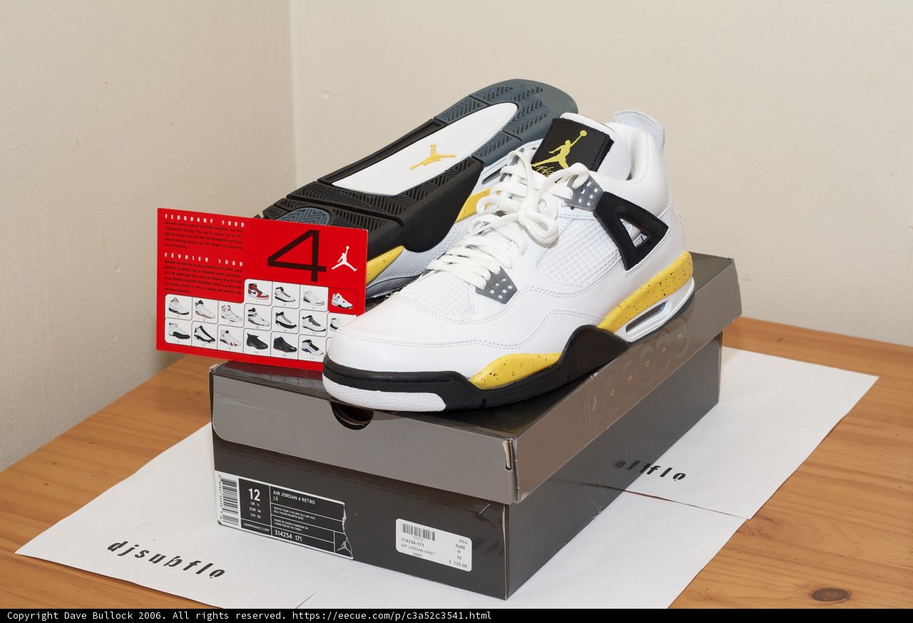 White and Yellow Sneakers on a Table