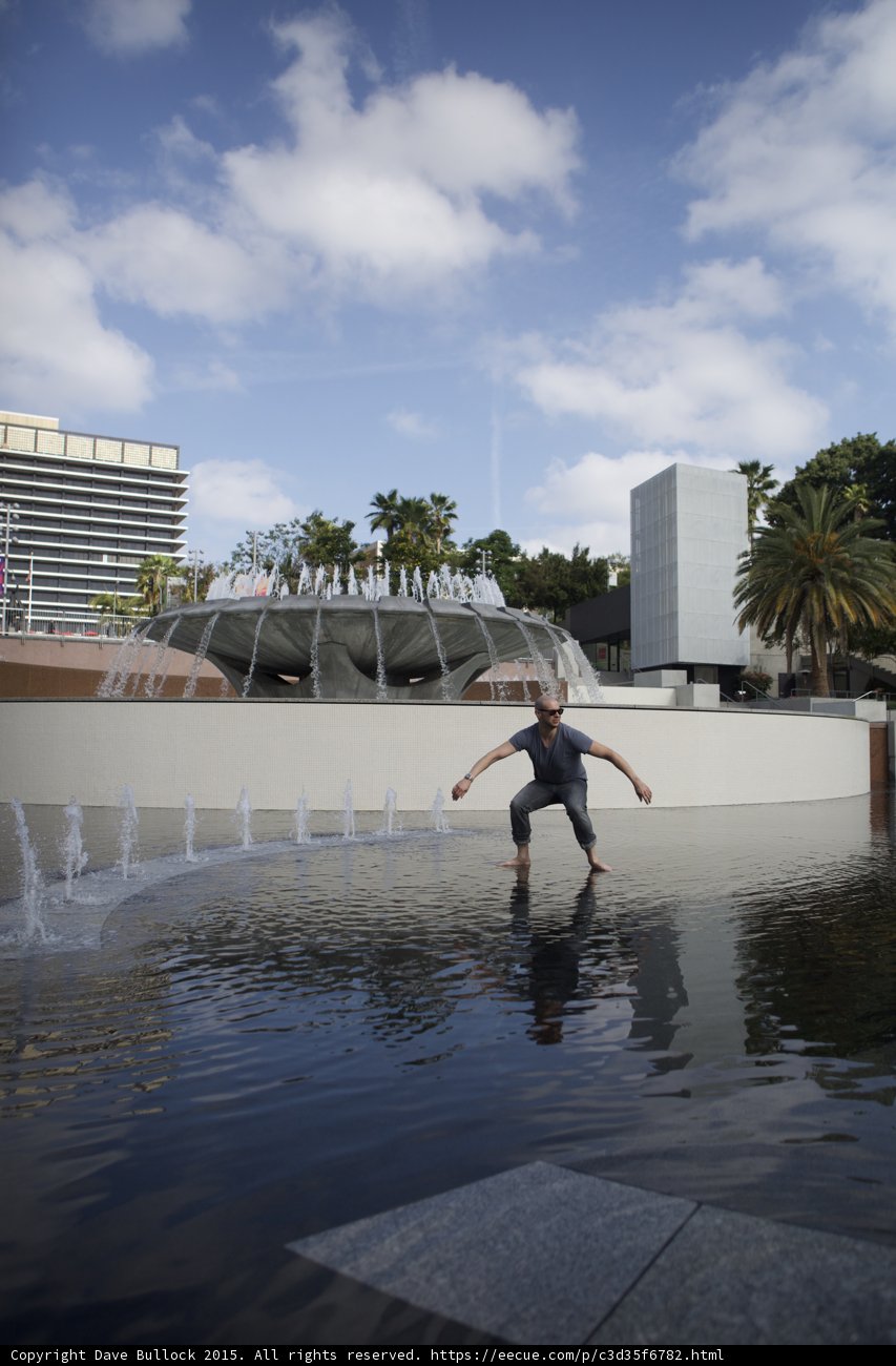 Surfing Pose in Fountain