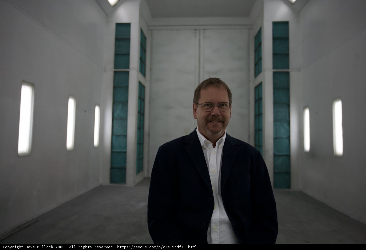 The Elegant Man in the Glass Corridor