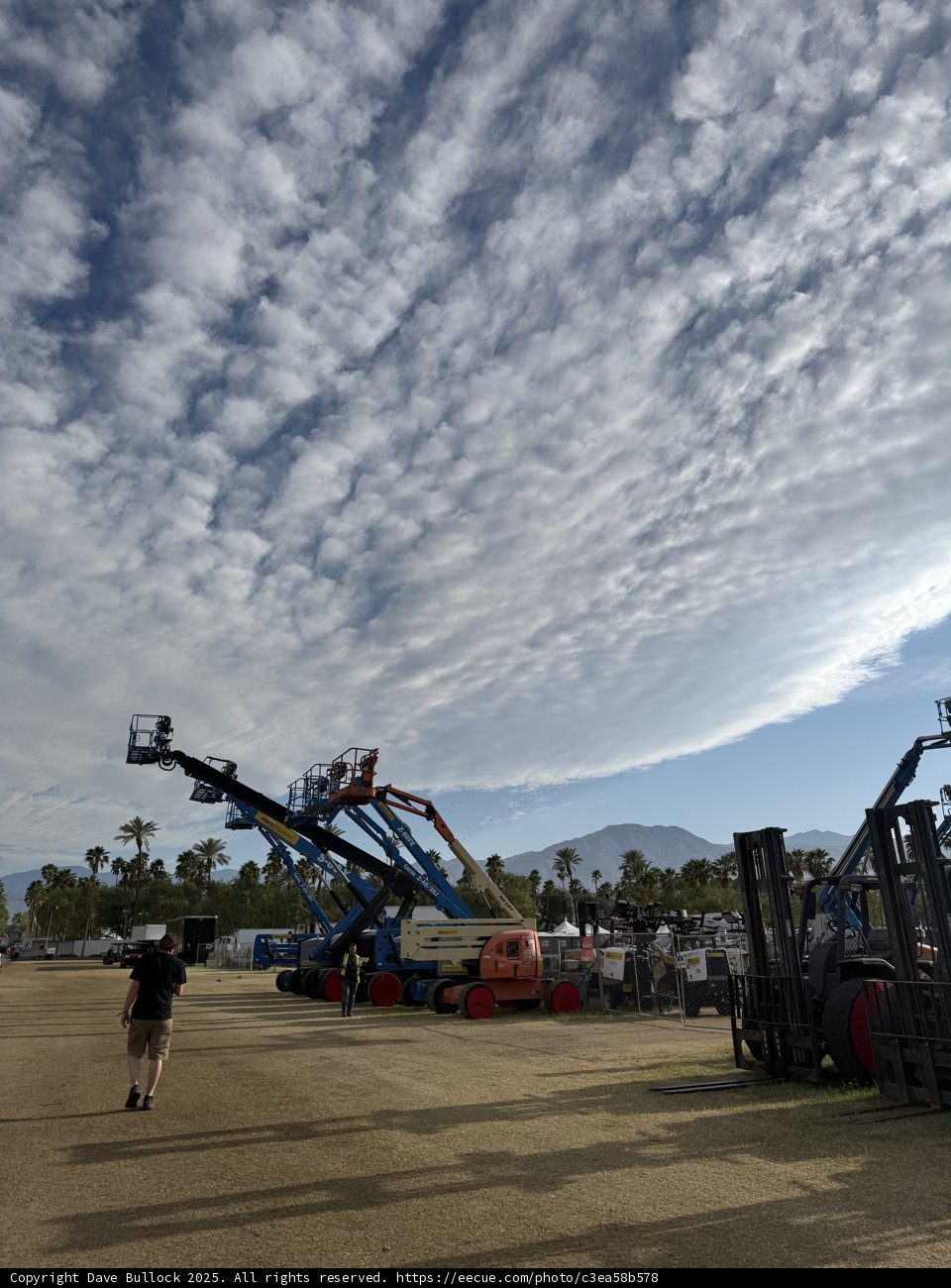 Machines Under a Dramatic Sky