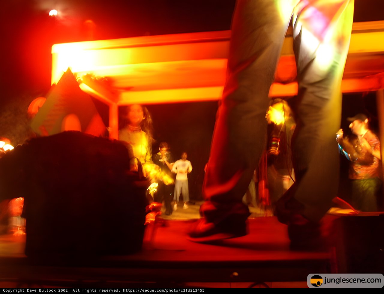 Electronic Music Performance with Dramatic Red Lighting