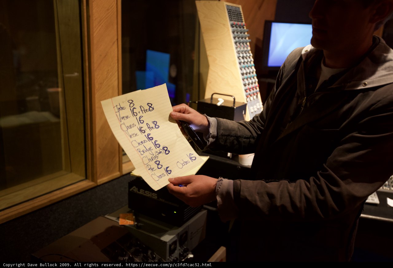 Man Checking Document on Laptop