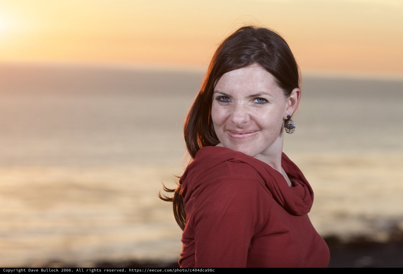 Woman in Red at Golden Sunset by the Sea