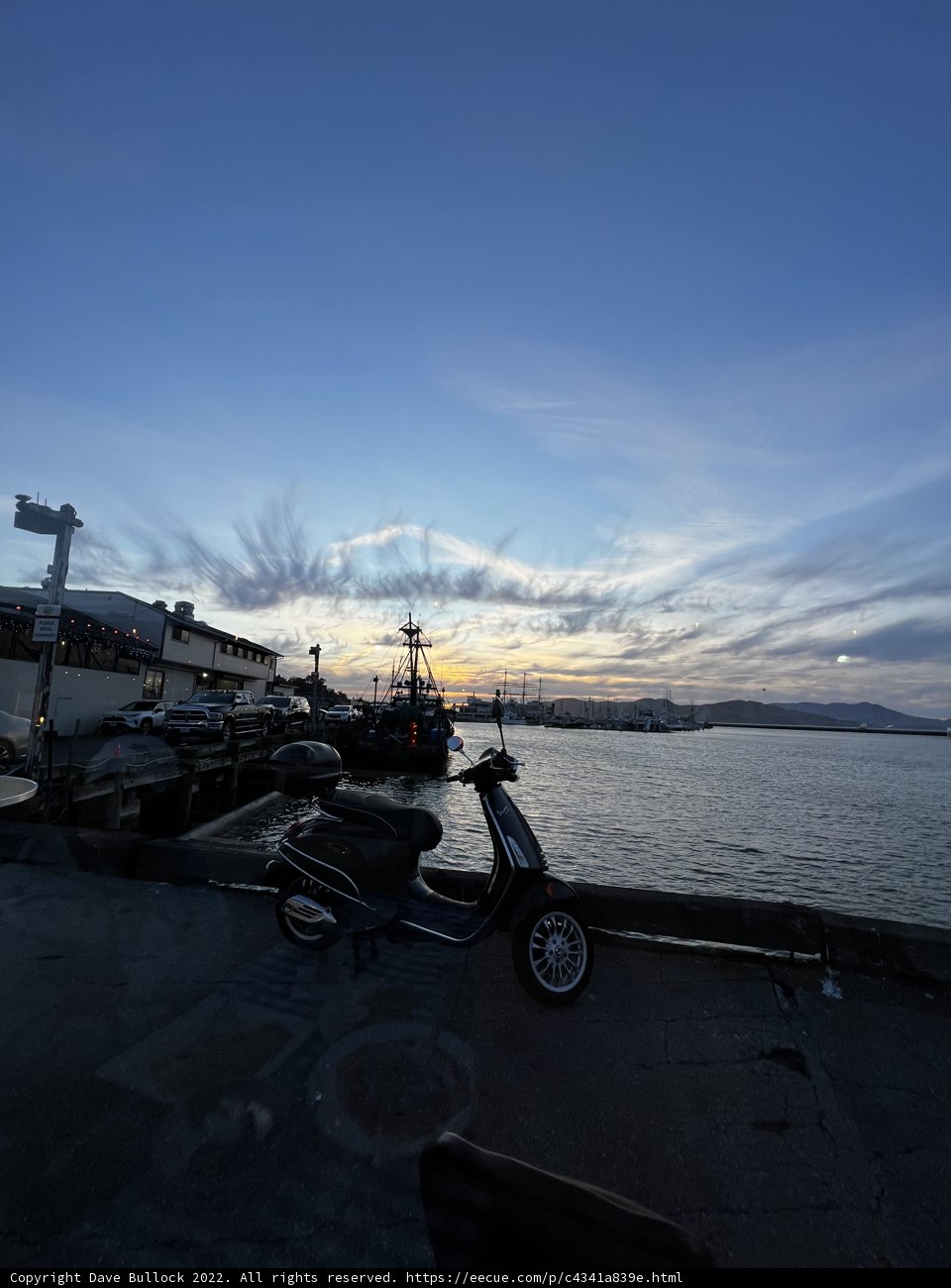Sunset Scooter by the Dock