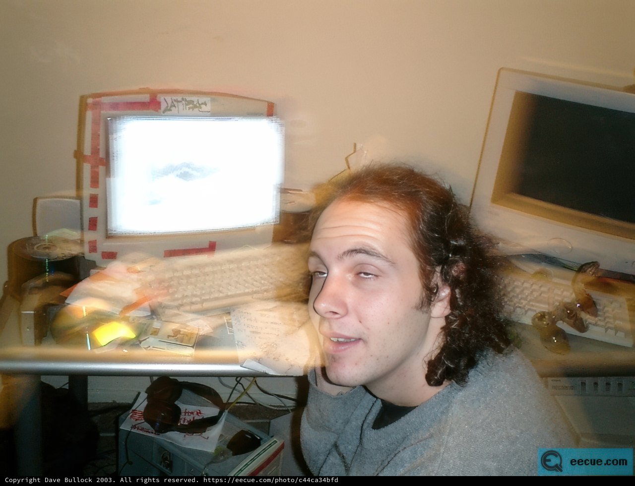 Man working diligently on his computer