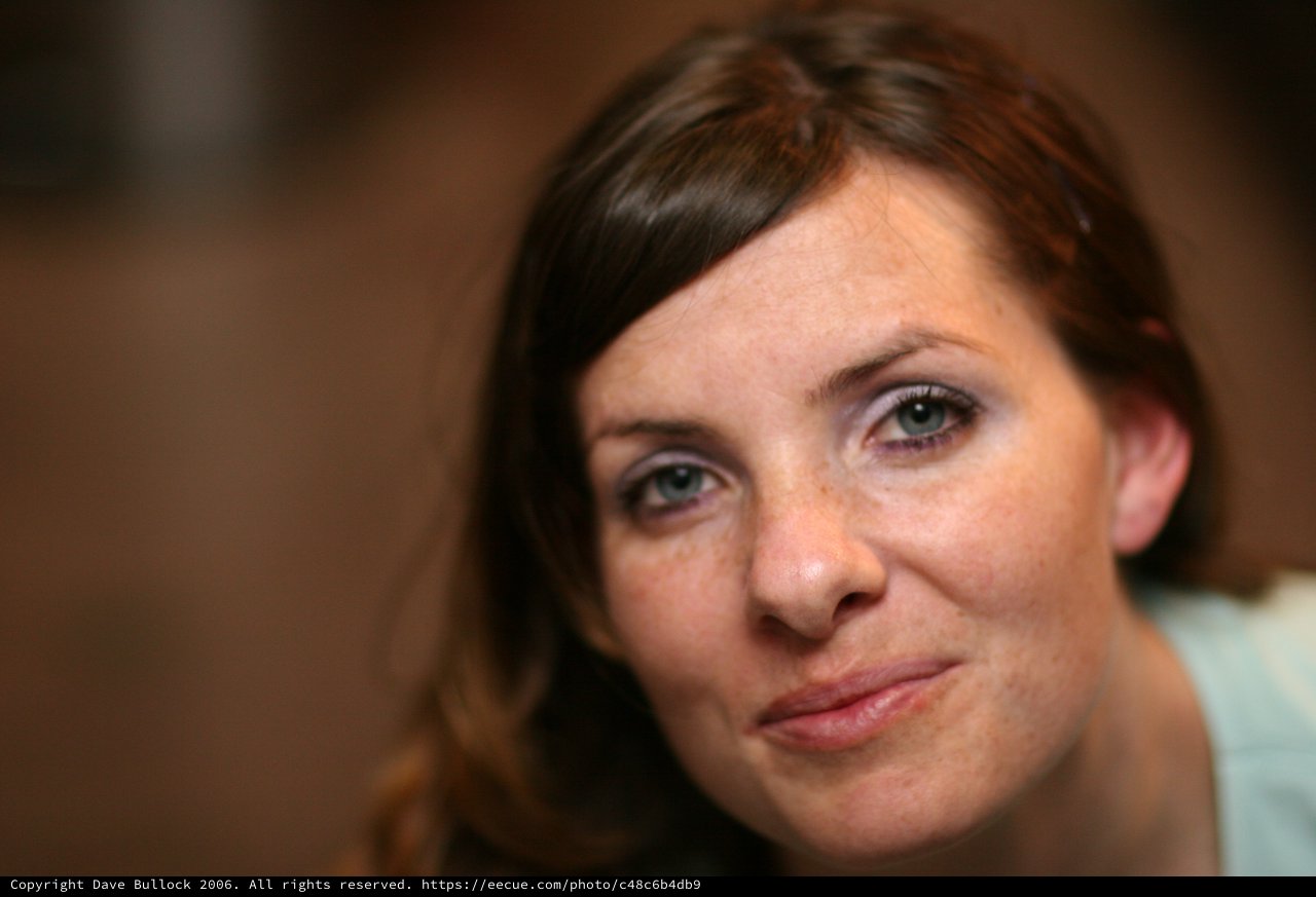 Candid Portrait of a Woman with a Knowing Smile