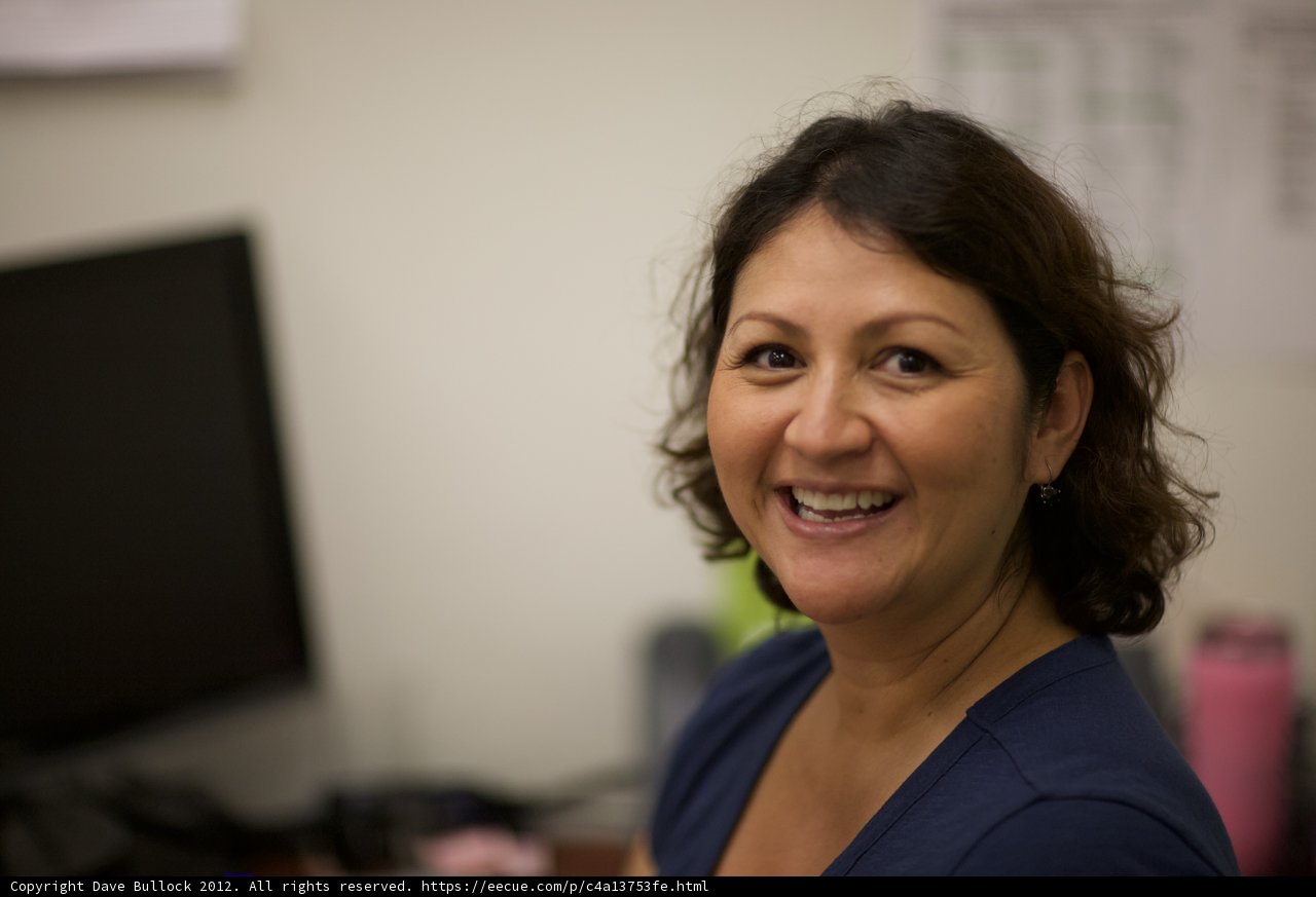 Happy Woman with Computer Monitor