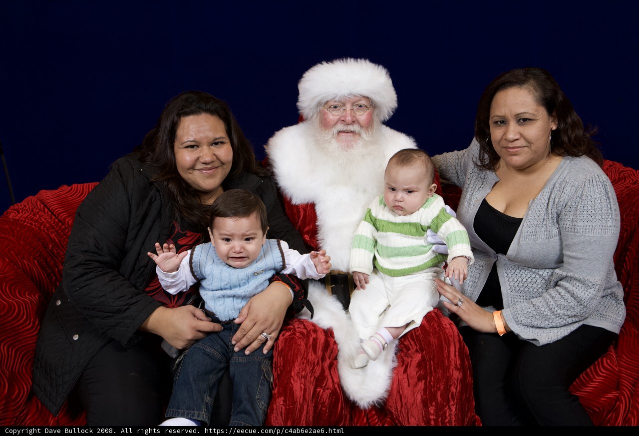 Family Christmas Photo with Santa Claus