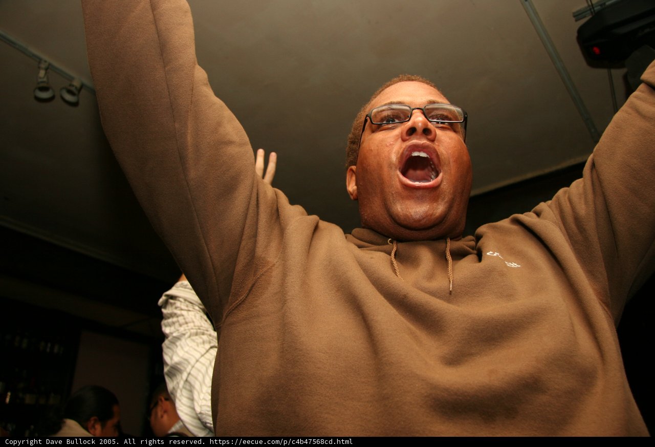 Angry Man in Brown Sweater