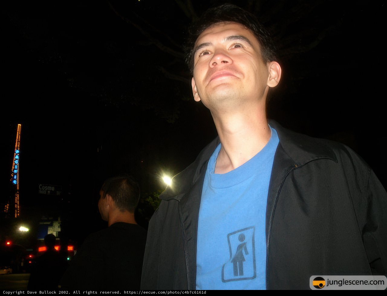 Blue Shirted Man in the Night Sky
